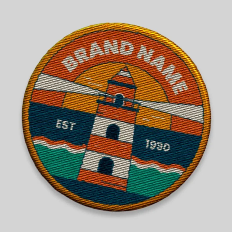 Round embroidered patch with a lighthouse design
